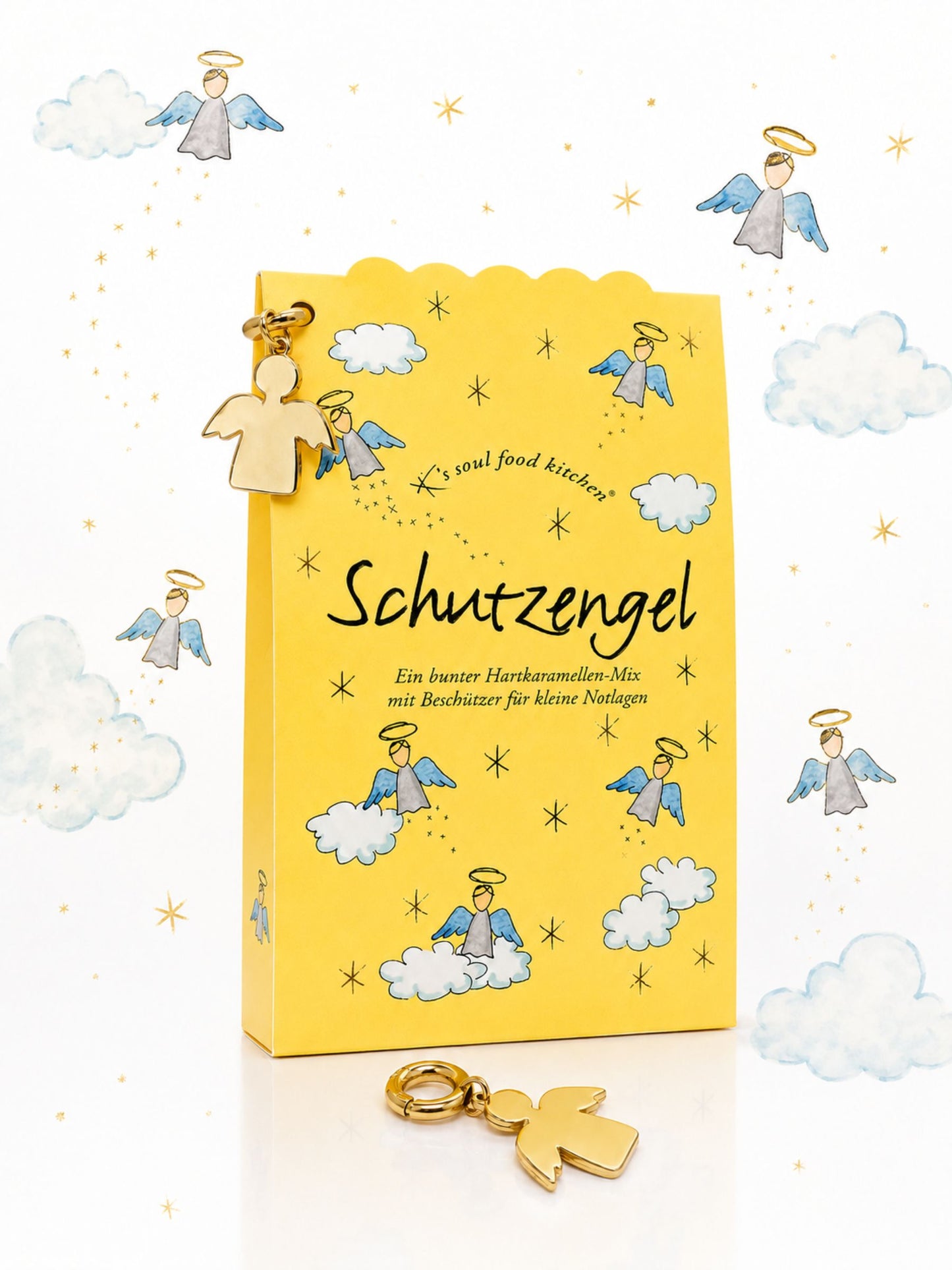 Schutzengel Bonbons mit Anhänger 50g von K's Soul Food Kitchen vor Hintergrund mit Engeln