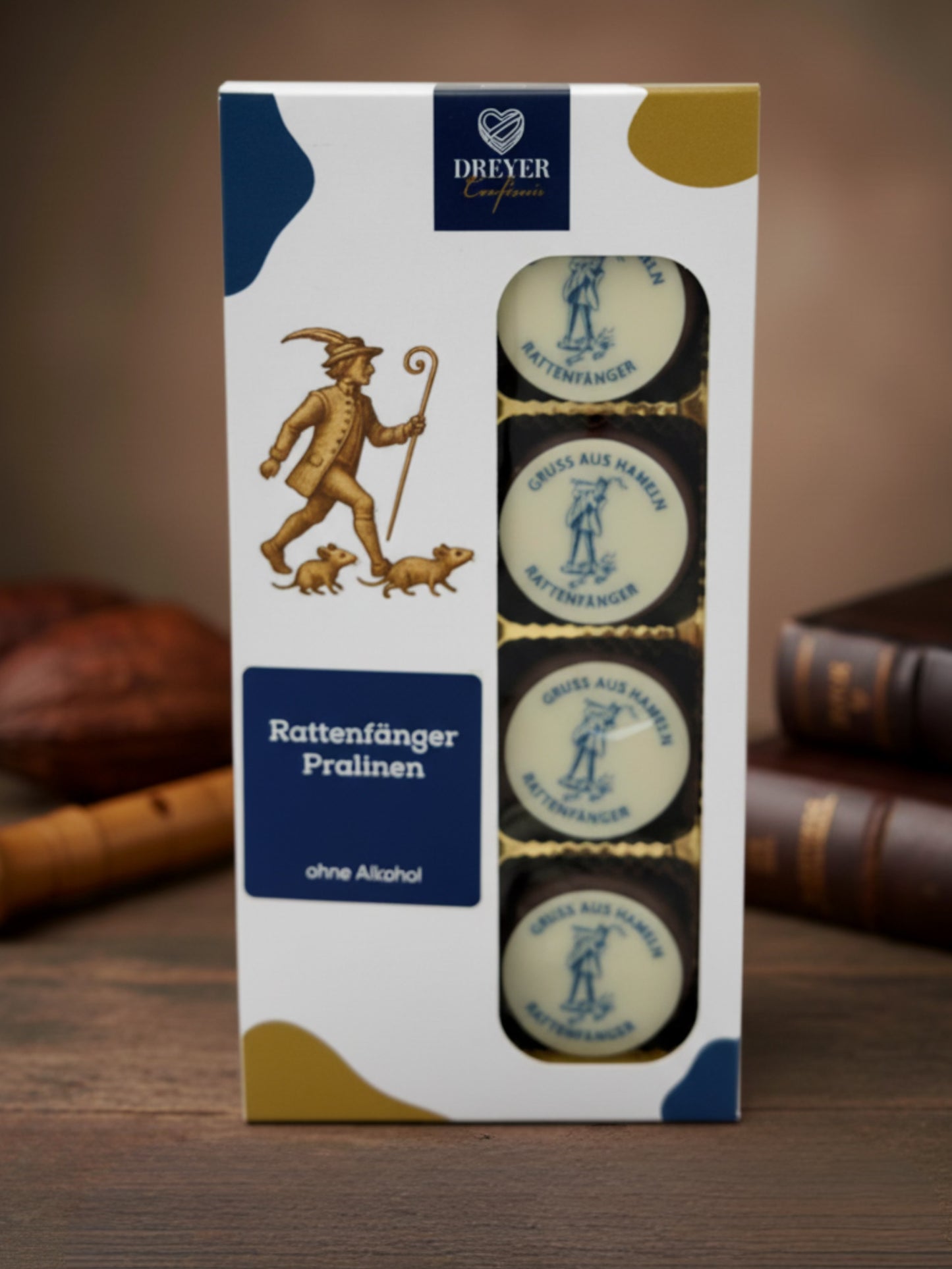 Dreyer Confiserie Signettrüffel Rattenfänger von Hamel.  8 Vollmilch-Trüffel mit Schokoladenaufleger ‚Gruß aus Hameln‘, hergestellt von Wagner Pralinen für die Dreyer Confiserie aus der Hameln. 